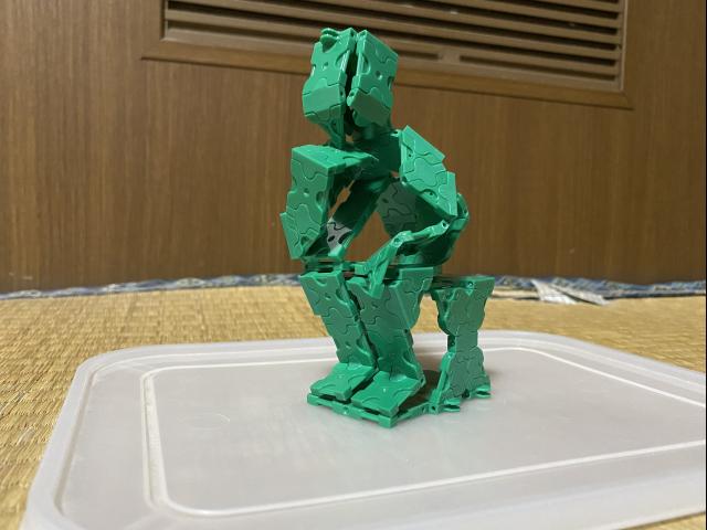 考える人